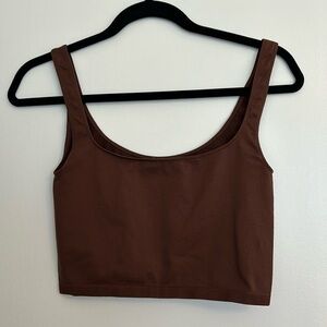 Free people brown tank. In perfect condition. Size M/L.